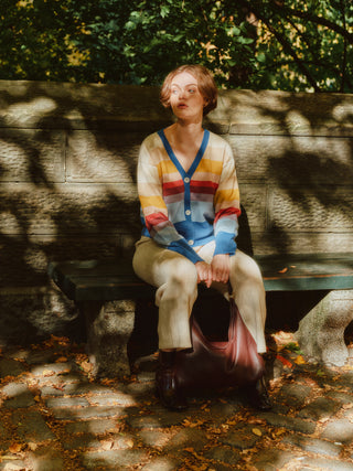 Amanecer Alpaca Cardigan — gradient alpaca knit inspired by sunrise over Uyuni Salt Flats, ethically handmade in Bolivia.