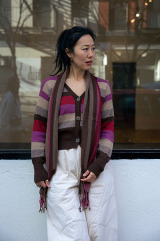 Atardecer Alpaca Cardigan — striped alpaca knit in earthy brown, taupe, crimson, and violet, inspired by Andean sunsets.
