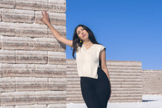 Mullu Alpaca Cardigan — reversible alpaca cardigan with two-tone design and V-neckline front or back, timeless knit made in Bolivia.