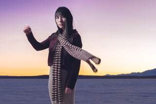 Zebra Alpaca Scarf — alpaca scarf inspired by La Paz’s Zebra character, soft and warm, handmade in Bolivia.