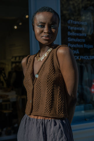 Panti Alpaca Vest — hand-crocheted alpaca vest with openwork stitch, crystal or mother-of-pearl buttons, artisan-made in Bolivia.