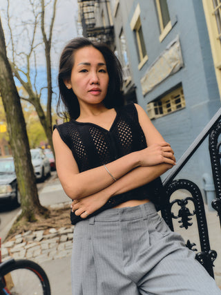 Panti Alpaca Vest — hand-crocheted alpaca vest with openwork stitch, crystal or mother-of-pearl buttons, artisan-made in Bolivia.