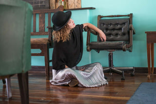 Warawara Alpaca Poncho — alpaca sweater-poncho with sleeves and flowing silhouette, handmade in Bolivia.